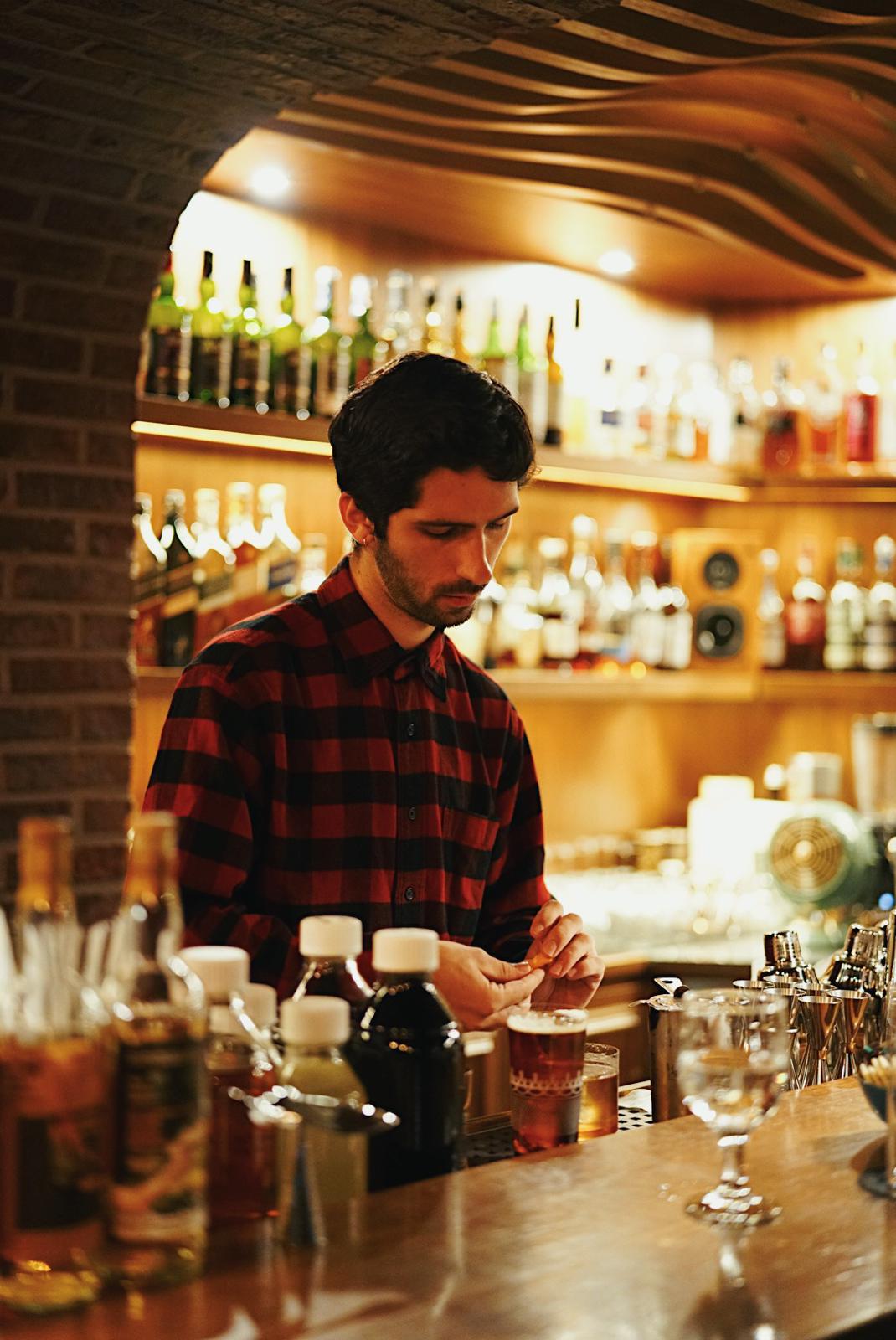 Preparing signature cocktails with the Kian team